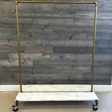 Monroe Trades Mobile Clothing Rack in gold with white shelf