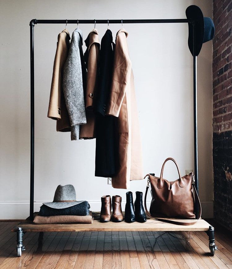 Clothing rack with distressed wood platforms