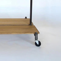Monroe Trades clothing rack closeup for bottom shelf and caster wheels