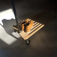 Monroe Trades rolling clothing rack with cedar shelf with boots