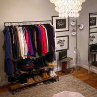 Monroe Trades rolling clothing rack with double shelf and hang bar with shoes and clothes in bedroom