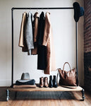 Clothing rack with distressed wood platforms