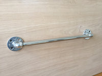 chrome finish hand towel or shower bar made out of industrial pipe