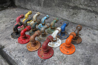Rustic hooks using black pipe